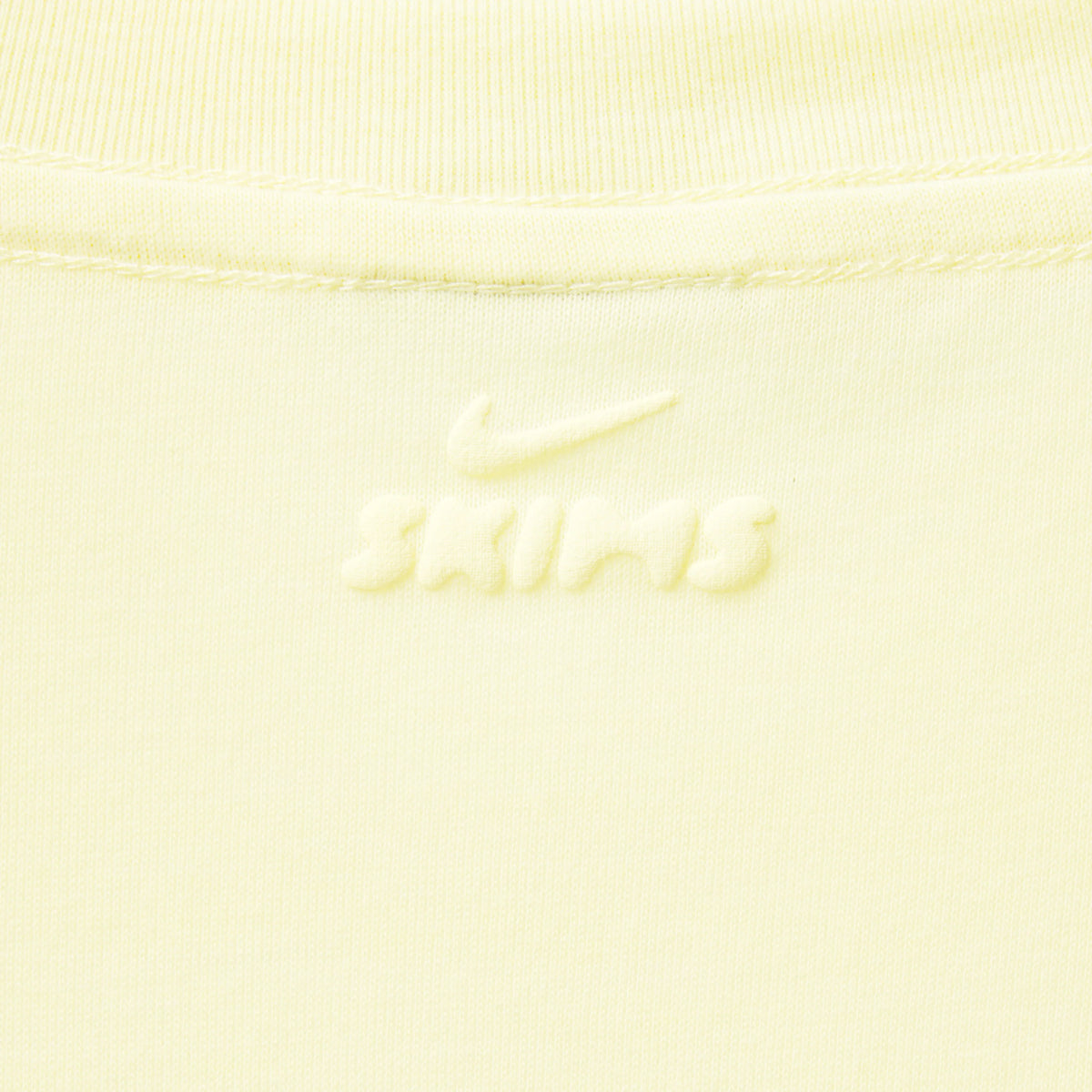 NikeSKIMS PERFORMANCE COTTON BLEND SHORT SLEEVE V-NECK CROP TOP | BICYCLE YELLOW