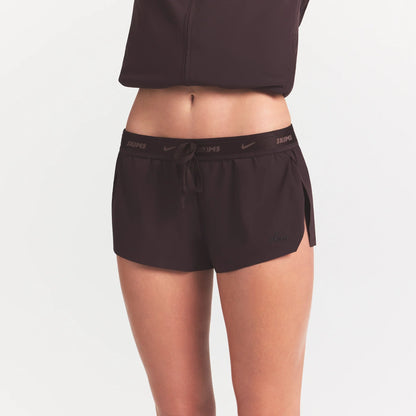 NikeSKIMS STRETCH NYLON RUNNER SHORT | DARK ROAST