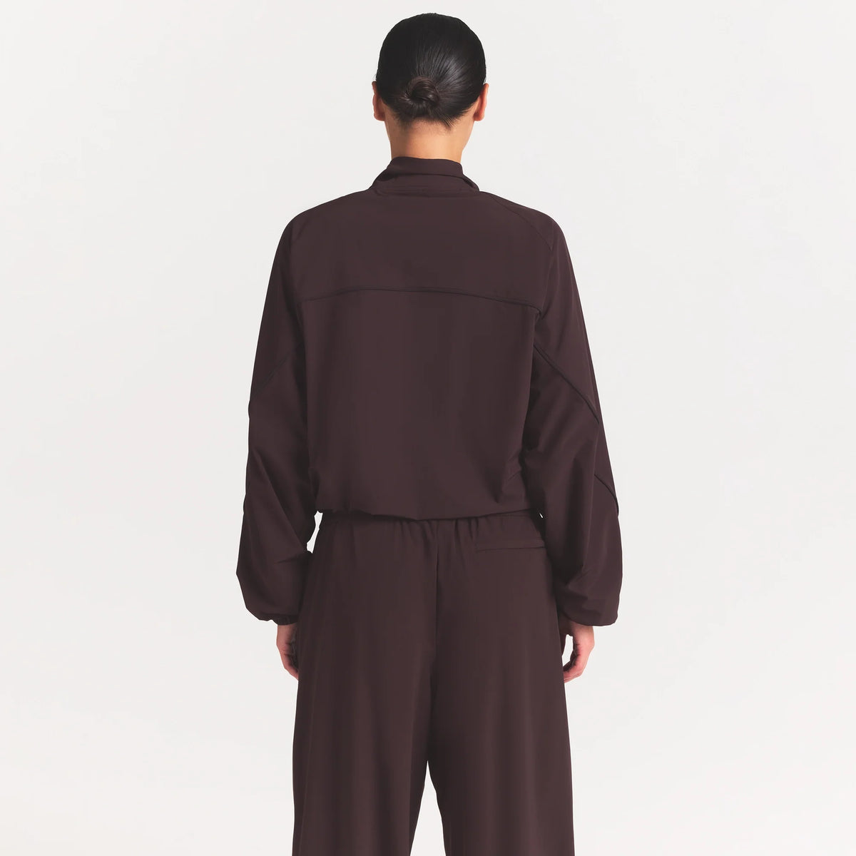 NikeSKIMS STRETCH NYLON OVERSIZED TRACK JACKET | DARK ROAST