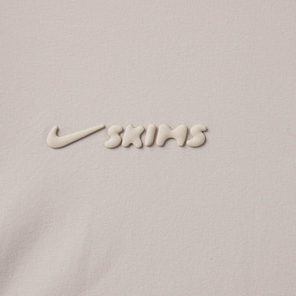 NikeSKIMS WOVEN NYLON 5" TRACK SHORT | STONE
