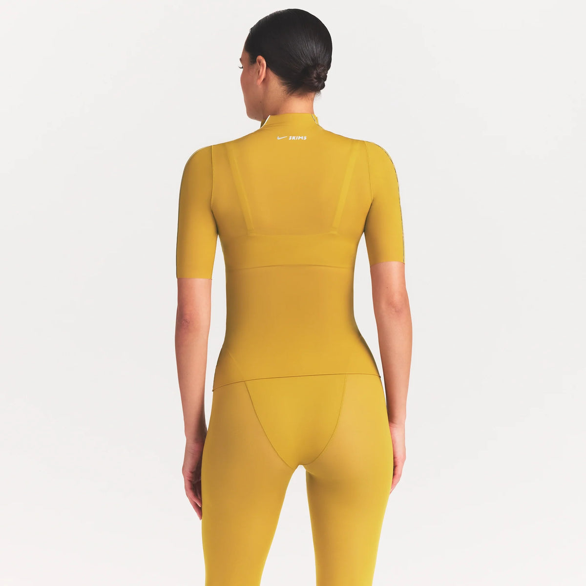 NikeSKIMS WEIGHTLESS LAYERS MOCK NECK SHORT SLEEVE T-SHIRT | CITRINE