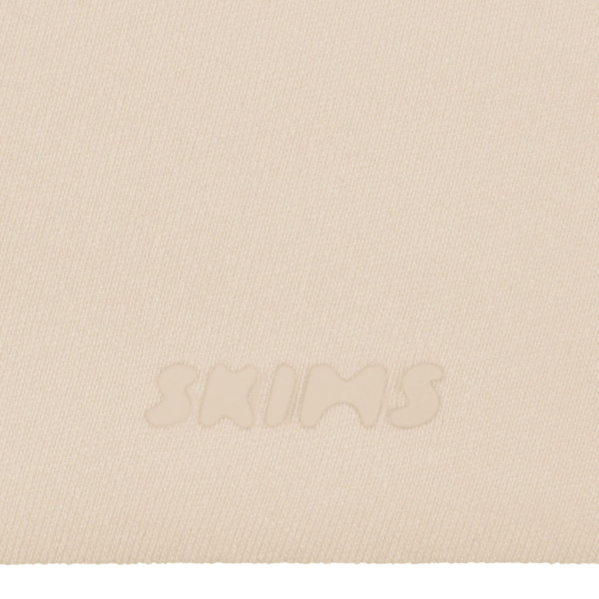 SKIMS ULTIMATE BODY PUSH-UP THONG BODYSUIT | SAND