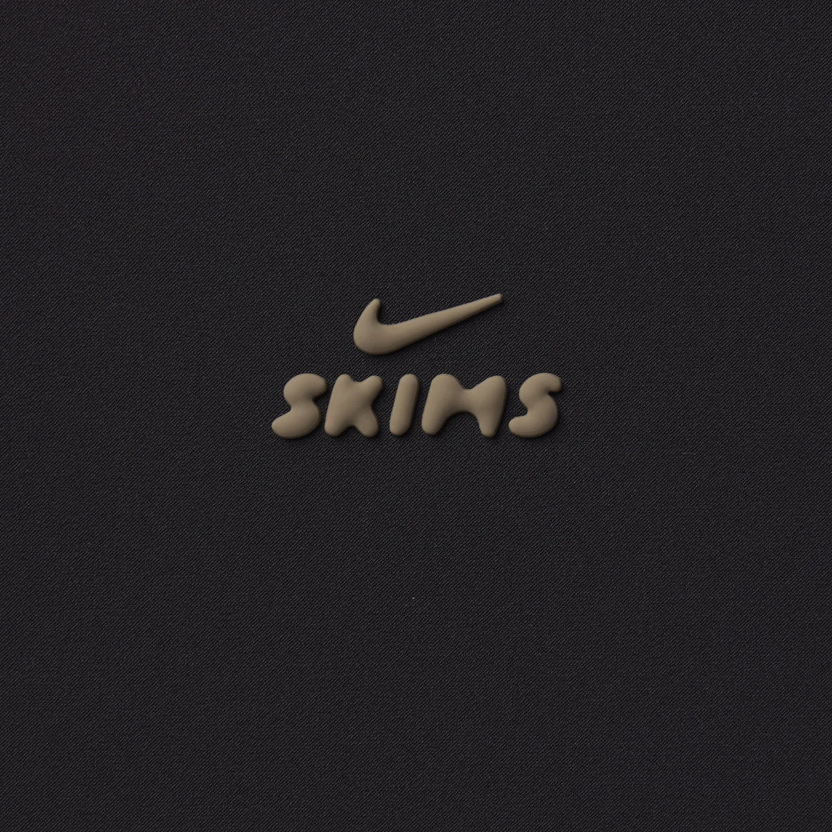NikeSKIMS STRETCH NYLON OVERSIZED TRACK JACKET | OBSIDIAN OLIVE GREY