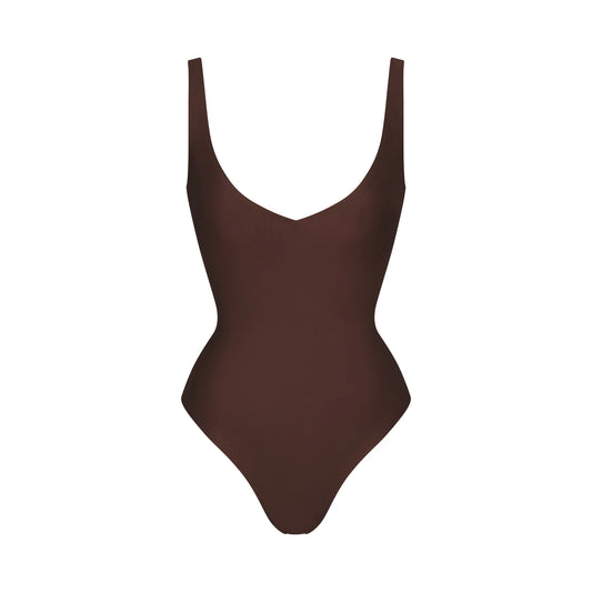 SKIMS BODY UNLINED PLUNGE THONG BODYSUIT | COCOA