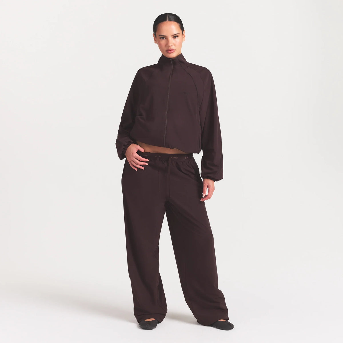 NikeSKIMS STRETCH NYLON OVERSIZED TRACK JACKET | DARK ROAST