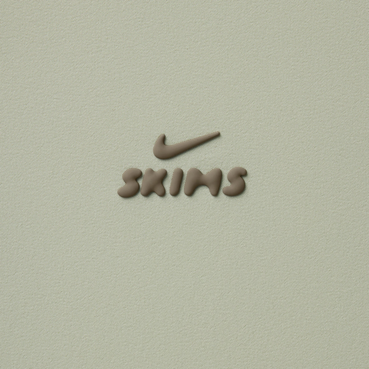 NikeSKIMS STRETCH NYLON RUNNER SHORT | TALC