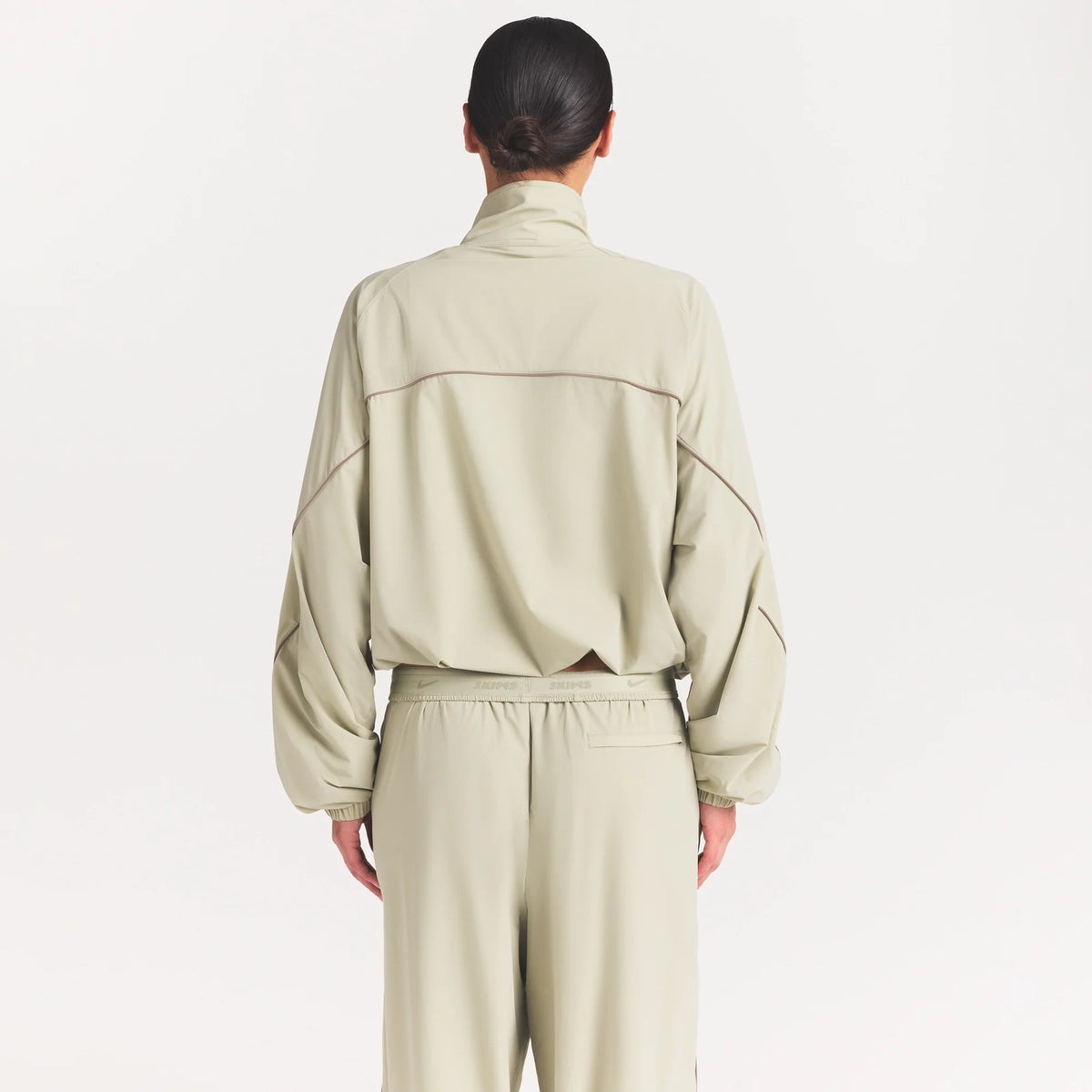NikeSKIMS STRETCH NYLON OVERSIZED TRACK JACKET | TALC