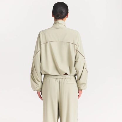 NikeSKIMS STRETCH NYLON OVERSIZED TRACK JACKET | TALC