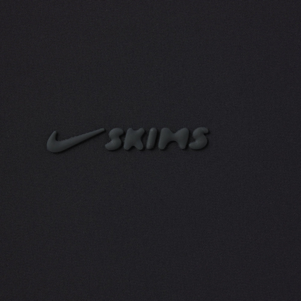 NikeSKIMS WOVEN NYLON 5" TRACK SHORT | OBSIDIAN