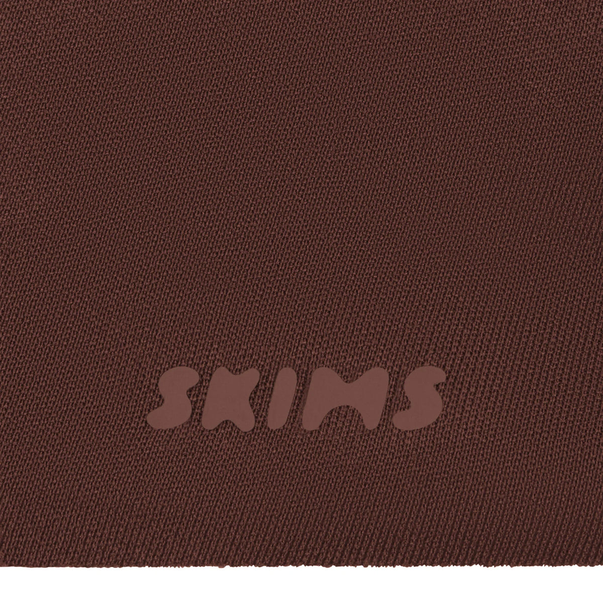 SKIMS ULTIMATE BODY PUSH-UP THONG BODYSUIT | COCOA