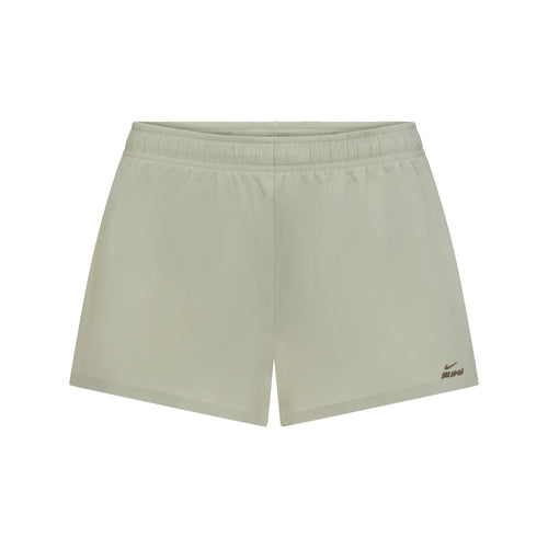 NikeSKIMS STRETCH NYLON RUNNER SHORT | TALC